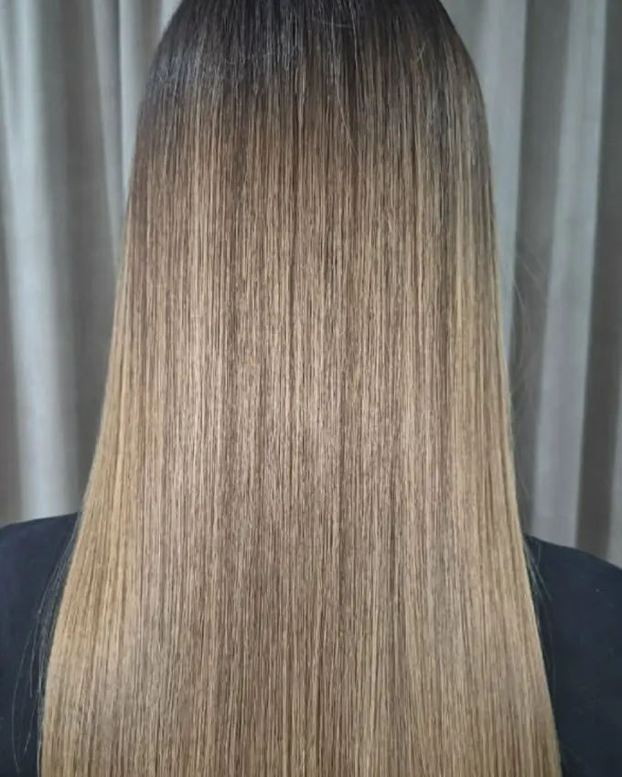 The same hair straight and glossy through the lengths