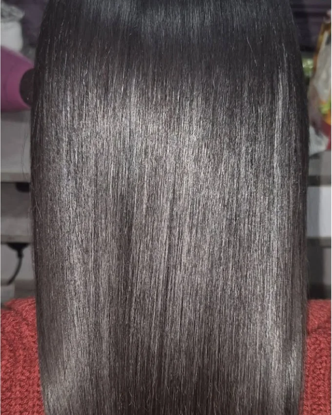 The same hair straight with a mirror shine