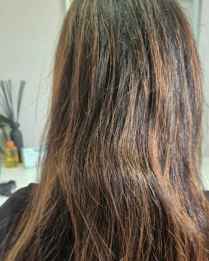 Brown hair with a rough, uneven surface