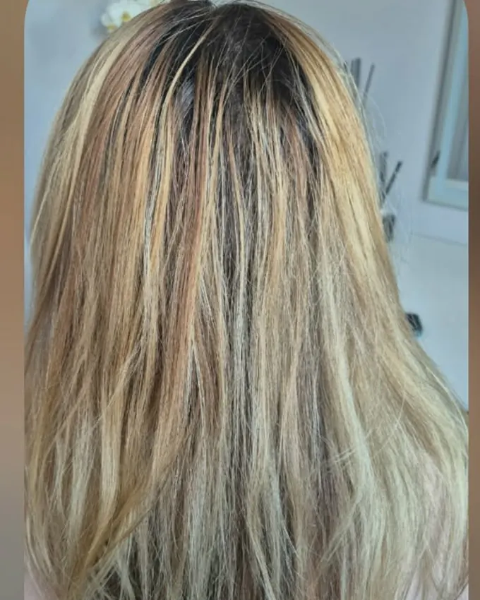 Blond hair with a dark, sharply marked root
